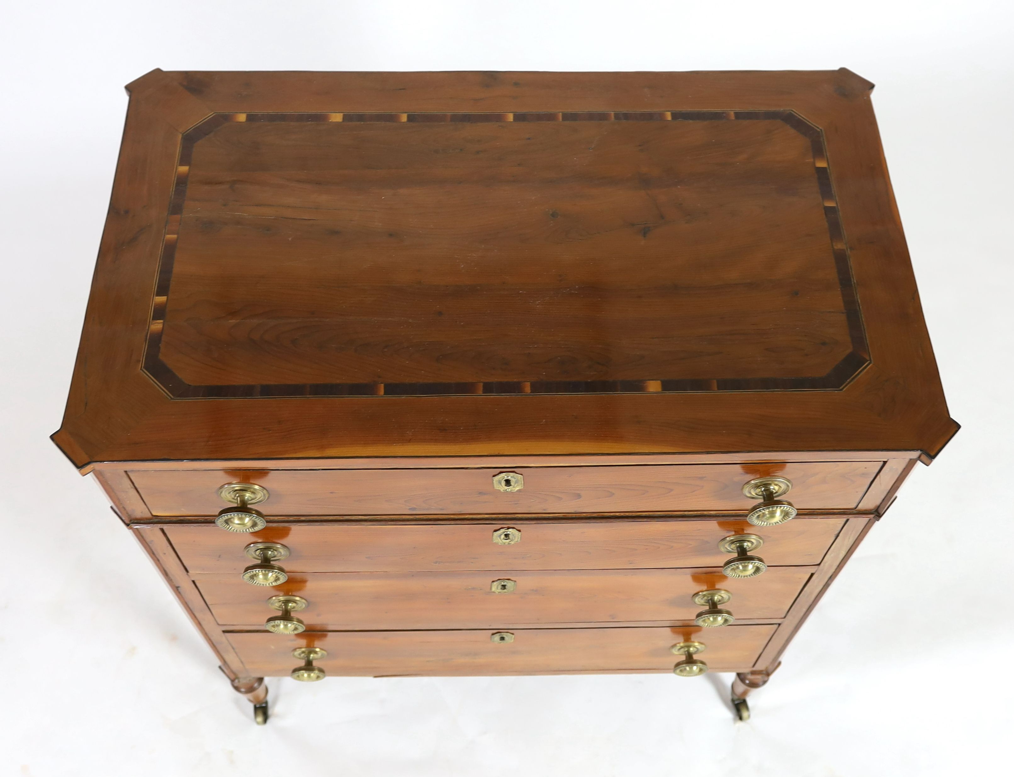 A Regency inlaid yew wood chest W.89cm D.54cm H.99cm